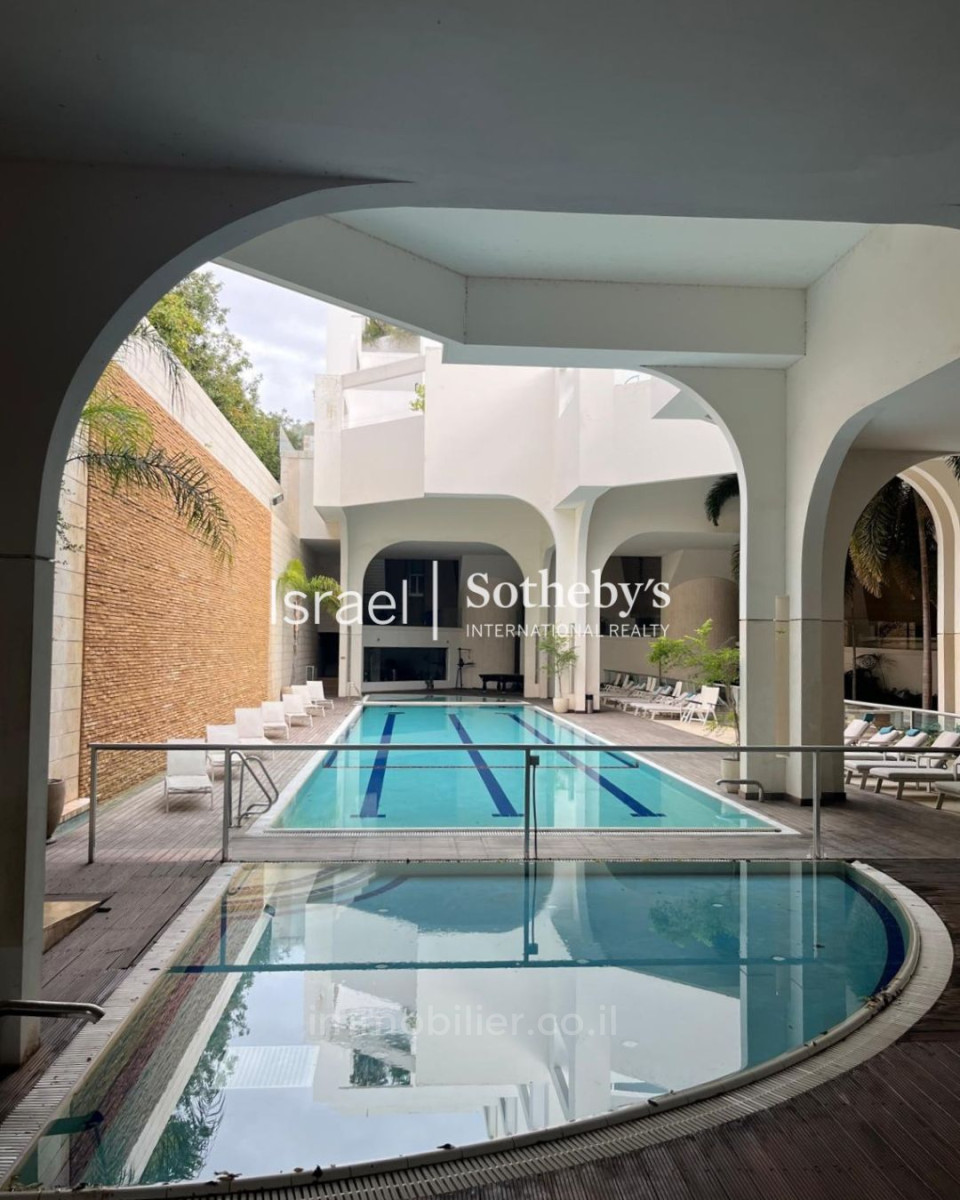 Dzielnica mieszkaniowa Appartement duplex concu architecturalement a tel aviv nord